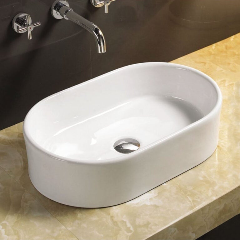 כיור חרס מונח אובלי דגם רגב בגימור לבן, מידות 55x35x14 ס"מ, עיצוב חזק ומעודן